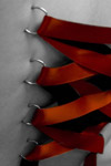 Piercing corset