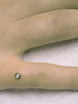 Piercing main